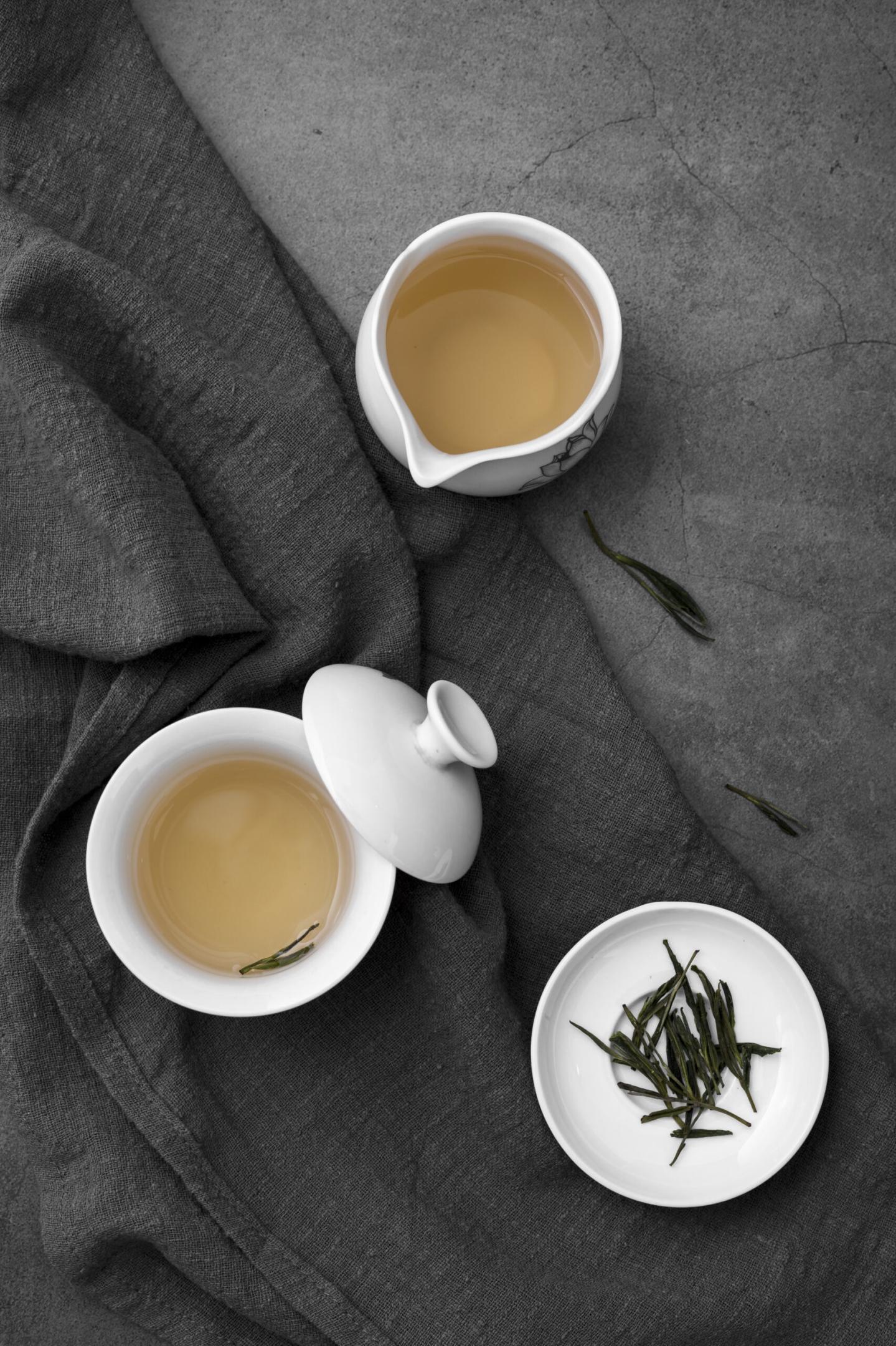 flat-lay-arrangement-with-tea-cups-herbs